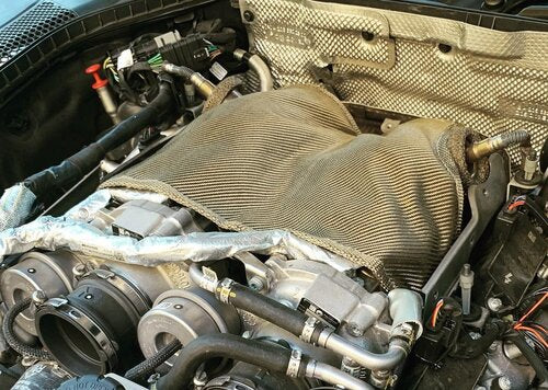 M177 Turbo Blanket installed on turbo in engine bay