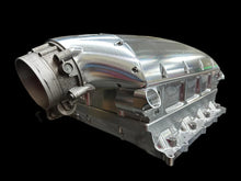 Load image into Gallery viewer, Metallic engine block on a black background